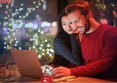 a man and woman playing in an online casino